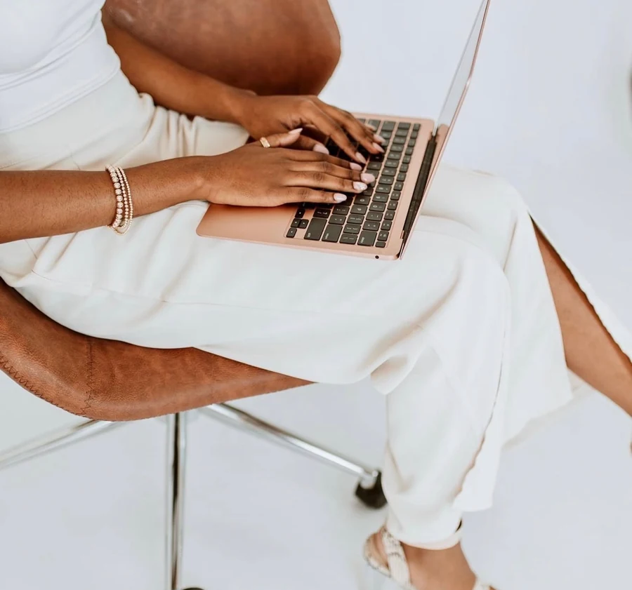 Attiya Smith working on a laptop